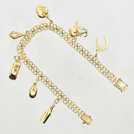 Armband X-länk med 7 berlocker, längd 19½ cm, bredd 6 mm, 18K. Vikt: 13,2 g