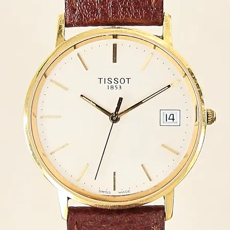 Herrur Tissot, 18K, quartz, Ø34mm, läderband ej original, datum, safirglas, gravyr, batteribyte krävs, inga tillbehör