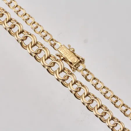 Collier i 18K guld, 45,5cm, Bismarck, docerat, bredd 3,4-6,1mm, tillverkad av Tore Clareus, år 1977, vikt 12,24g.