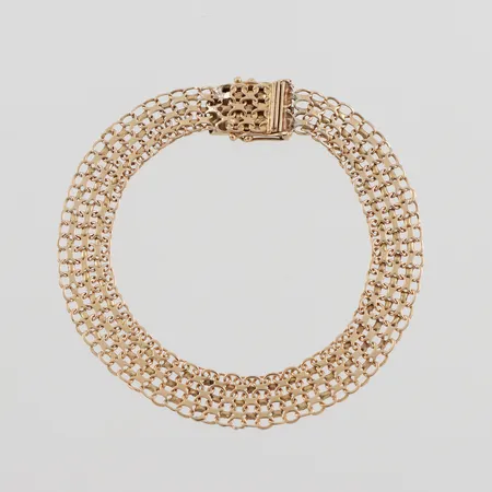 Armband x-länk, slitna länkar, J&A Köping, längd ca 19 cm, bredd 9.5 mm, 18k. Vikt: 11,8 g