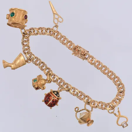 Armband, Bismarck, 18,5cm, 7 berlocker, några saknar stenar, 18K Vikt: 22,7 g