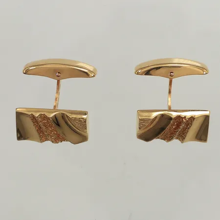 Ett par manschettknappar, 19x12mm, BEH Bengt Hallberg Guldsmeds AB, år 1988, 18K Vikt: 12,2 g