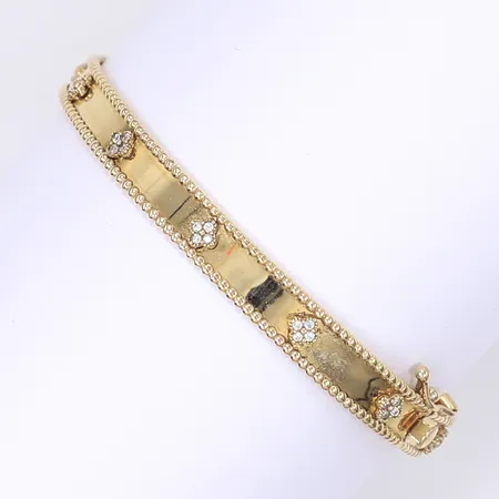 Armring med vita stenar, Ø57mm, bredd 7mm, något skev, 18K Vikt: 12,4 g