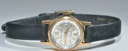 1 damur Populär 18k(går ej) med läderarm. 37361:1 au 1610 Vikt: 0 g