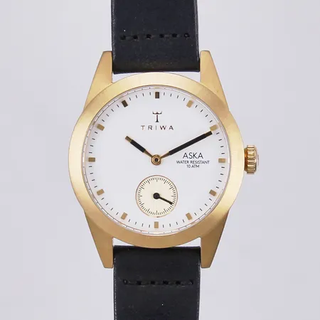 Damur Triwa ASKA, quartz, stål boett med läderband, refnr: AKST101, Ø 32mm, i behov av batteribyte, inga tillbehör