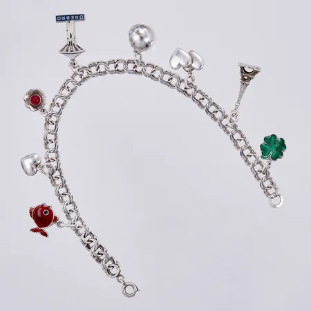 Armband Bismarck med åtta berlocker varav en i metall, längd: ca 19,5cm, bredd: ca 6mm, NSE, N S E Guldvaru Aktiebolag, Köping, år 1968, 830/1000 silver  Vikt: 15,7 g
