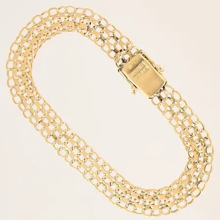 Armband X-länk, längd 22,5cm, bredd 9mm, vissa länkbitar med slitage, 18K  Vikt: 15,7 g