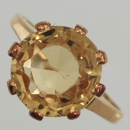Ring, gul sten, skadade fasetter, stl 16, bredd 1,6-11,9mm, 18K  Vikt: 5,4 g