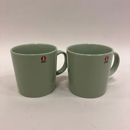 2 Muggar, Iittala, Teema, Kaj Franck, höjd 8cm, celadon grön, etikettmärkt, Vikt: 0 g Skickas med paket.