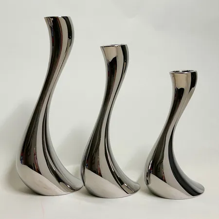 3 Ljusstakar Georg Jensen, Cobra 13cm, 21cm & 24cm, rostfritt stål, svart i och vid ljushållaren Vikt: 0 g