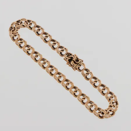 Armband Bismarck,slitet, längd ca 20 cm, bredd 6.8 mm, 18k. Vikt: 15,8 g