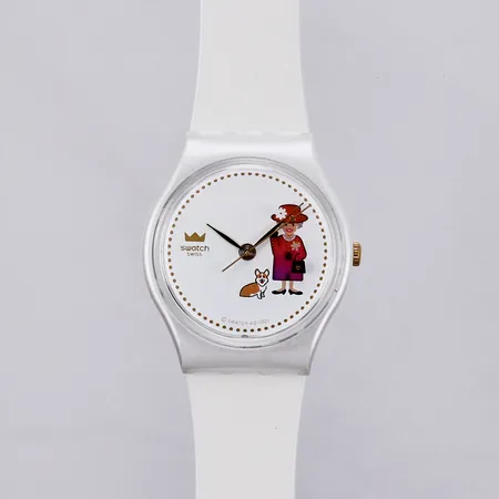 Armbandsur Swatch "How Majestic", boett i plast och armband i gummi, #ändring utav fIC19, battery 90#SR1130SW,  The centerpiece of this watch is the color-changing calendar wheel that changes the Queen's outfit color daily. Ø 34mm, inga tillbehör