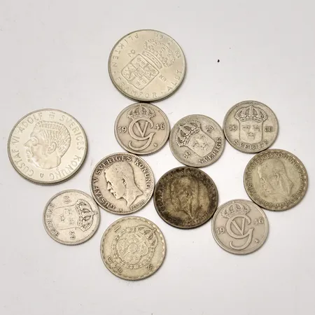 Diverse svenska mynt i silver, vikt 80,84g.