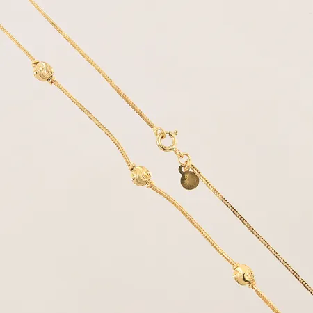 Collier Rävsvans med integrerade kulor, längd 56cm, bredd 1,1-4,9mm, smärre ojämnheter, 21K Vikt: 7,6 g