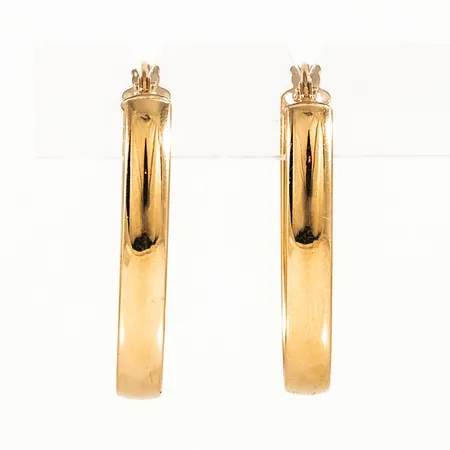 Ovala creoler i 18K guld. Mått 28,5 x 15,5 x 4 mm. Vikt: 1,9g. Stämplad GHA, 750. 