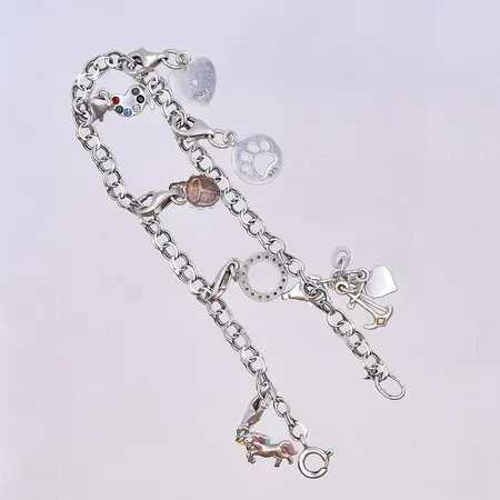 Armband Bismarck med berlocker, längd 19 cm, bredd länk 3 mm, silver 925/1000. Vikt: 8,6 g