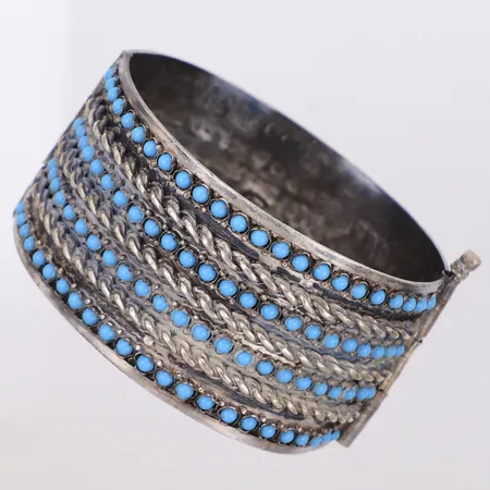 Stelt armband med turkosa stenar, sten saknas, Ø65mm, bredd 37mm, okänd stämpel830/1000 silver Vikt: 68,8 g