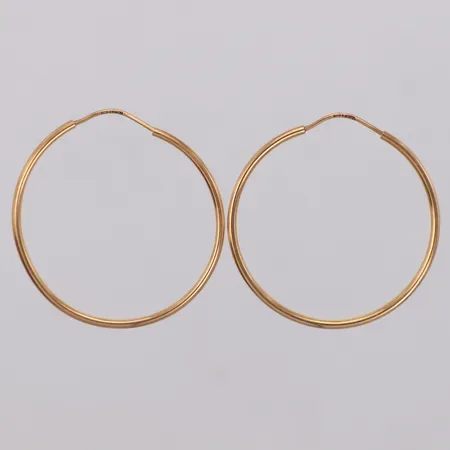 Ett par örhängen, Ø29,2mm, smärre ojämnheter, 18K Vikt: 1,6 g