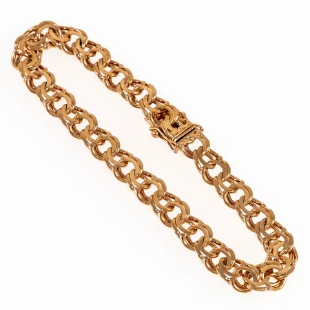 Armband, Bismarck i 18K guld. Det är 19,5 cm långt, 7,5 mm brett och väger 18,6g. Kistlås.