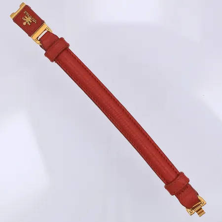 Armband Prada, rött läder, 18,5cm, gul metall, originaletui, etuiet slitet