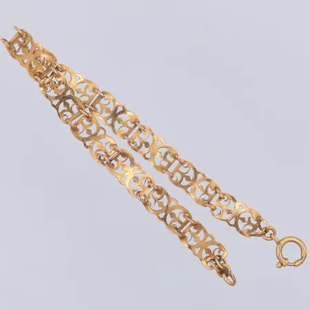 Armband, genombrutet mönster, 18,2cm, bredd 7mm, ojämnt, 18K Vikt: 5,9 g
