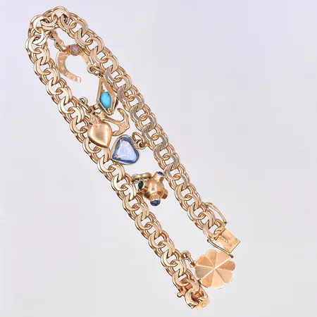 Armband Bismarck med berlocker, längd 18,5 cm, bredd länk 6 mm, 18K. Vikt: 20,3 g