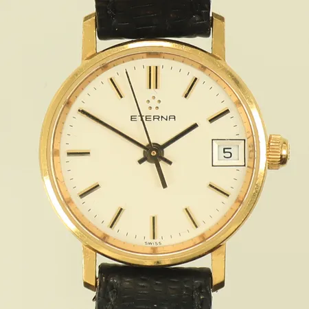 Damur Eterna, 18K i boett, Ø22mm, datum, quartz, trög krona, 18K, bruttovikt 14,2g