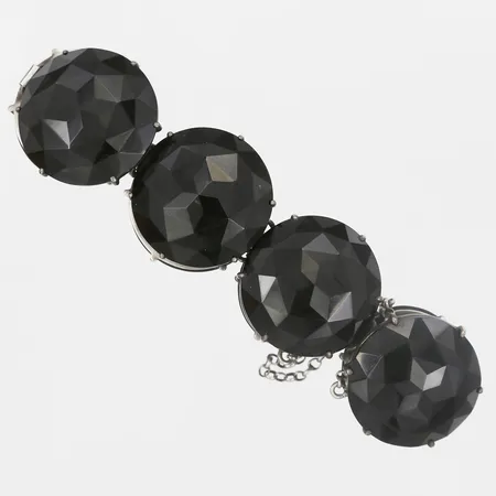 Armband, sorgesmycke, fasetterad onyx, Hedblom, Stockholm, 1891, längd 19cm, bredd 25mm, silver, bruttovikt 44g Vikt: 0 g