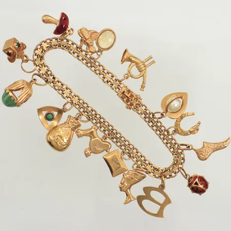 Armband X-länk med 16 berlocker, längd 19cm, bredd 5,4mm, Brofod Aktiebolaget Falköping 1961, 18K Vikt: 27 g