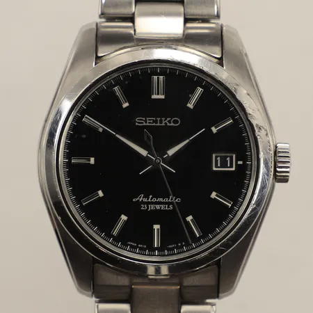 Armbandsur Seiko Automatic, Ø38mm, ref: 6R15-00c1 snr: 860562, glasbaksida, stållänk, längd 18cm inkl ur, djupa repor runt glas, inga övriga tillbehör