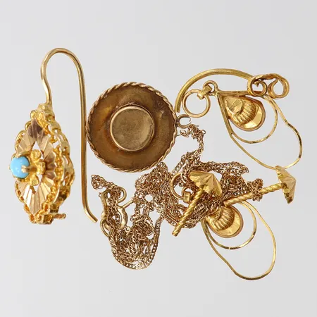 Guldskrot, defekt, 18K.  Vikt: 6,6 g