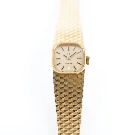 Damur Omega 18k m integrerad länk 18k, quartz, 14mm total längd 16cm, bruttovikt 31,3gr. batteribyte krävs