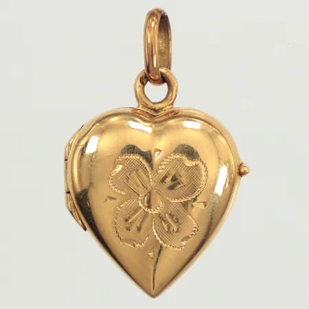 Medaljong hjärta, längd 25mm inkl ögla, bredd 15,5mm, 18K  Vikt: 2,9 g