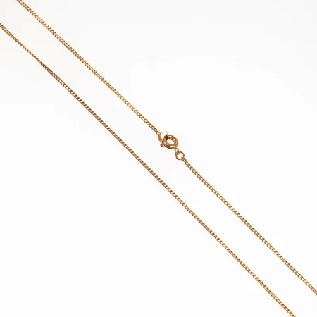 Kedja, Pansar i 18K guld. Den är 46 cm lång, 1,2 mm bred och väger 2,6g. 18K & kattfot. Springring. Äldre kedja.