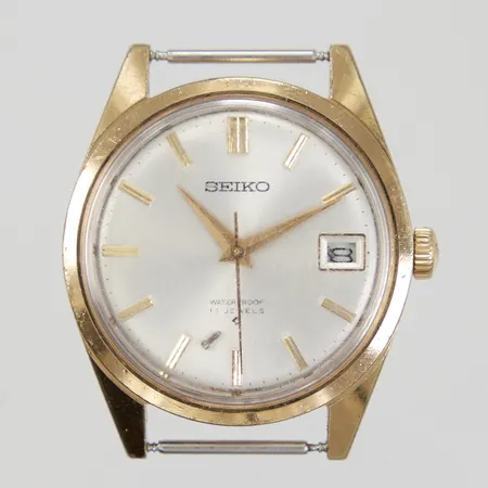 Herrur Seiko, manuell, datum, Ø 35mm, boetnr: 6602-8050, serienummer: 053507, utan armband, ligger lös skruv innanför glaset samt datumfönstret