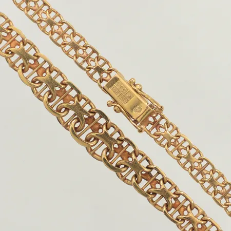 Collier doserad X-länk, längd 44cm, bredd 5,8-9mm, 18K Vikt: 25,4 g