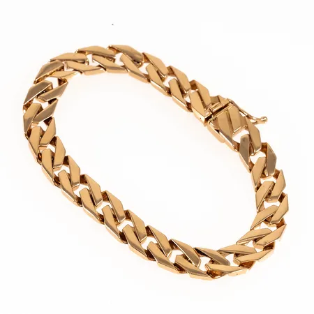 Armband, kantslipad pansar, i 18K guld. Det är 19,5 cm långt, 8,4 mm brett och väger 32,5g. Kistlås. Stämplat Liyan.gold 750 T1994 size 5.
