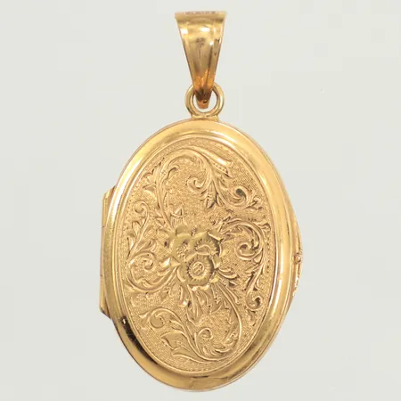 Medaljong, längd 35mm inkl ögla, bredd 17,5mm, 18K  Vikt: 4,9 g