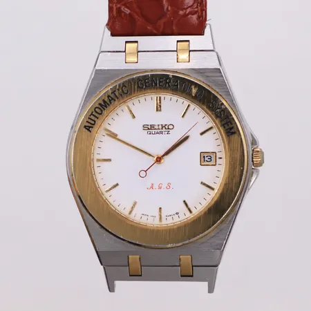 Herrur Seiko, 38mm, quartz, Automatic Generating System, färgbortfall på text, stål, datum, glasboett, ref 7M22-6A60, ser nr 921051, 1980-tal, repor på glas och boett, batteribyte krävs, läderband medföljer, inga tillbehör.