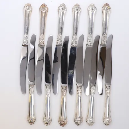 12 knivar med rostfria blad, längd 22cm, modell Sachsisk, Cohr, 830/1000 silver Vikt: 902,8 g