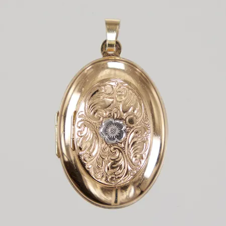 Medaljong/fotogömma, plats för 6 bilder, ca 20x36mm, omkrets ca 12,3mm, bruksspår, 18K bruttovikt 6,9g