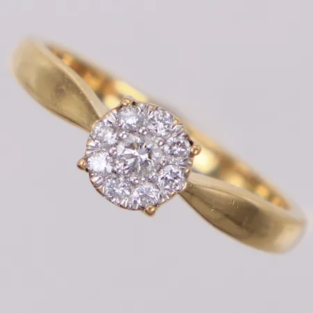 Ring med briljantslipade diamanter ca 0,17ctv, stl 17½, GHA, lätta  repor, 18K Vikt: 3,3 g