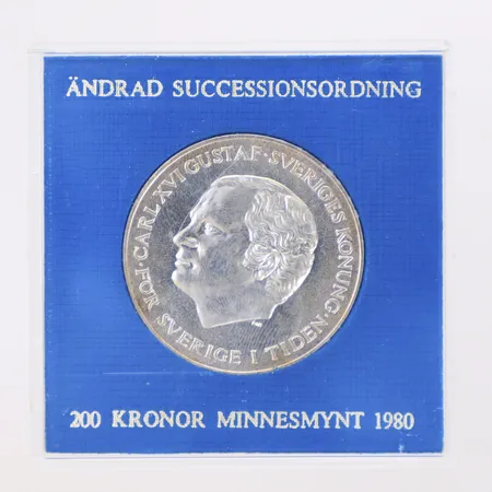 Minnesmynt 200 kronor, "ÄNDRAD SUCCESSIONSORDNING 1980", Ø36 mm, originaletui,  silver 925/1000 Vikt: 27 g