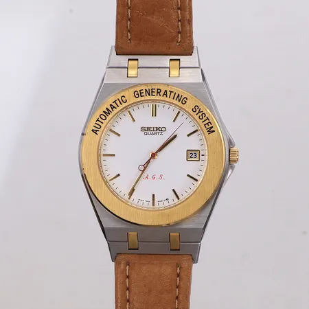 Herrur Seiko, Ø38mm, quartz, Automatic Generating System, datum, stål, glasboett, ref 7M22-6A60, serienr 8D0031, 1980-tal, brunt läderband, inga tillbehör.