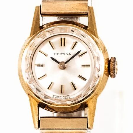 Smyckeur Certina i 18K guld med flexiband i metall. Boett Ø 17 mm, manuell, safirglas, går ej att dra upp. Bruttovikt: 19,1g. 