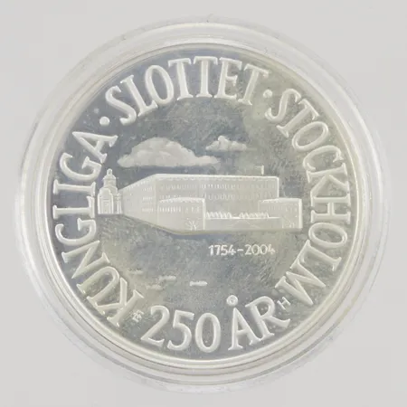 Minnesmynt, 200 Kronor - Carl XVI Gustaf Kungliga slottet Stockholm 250år, Ø36mm, präglat år 2004, plastetui, 925/1000 silver, 27,0g.