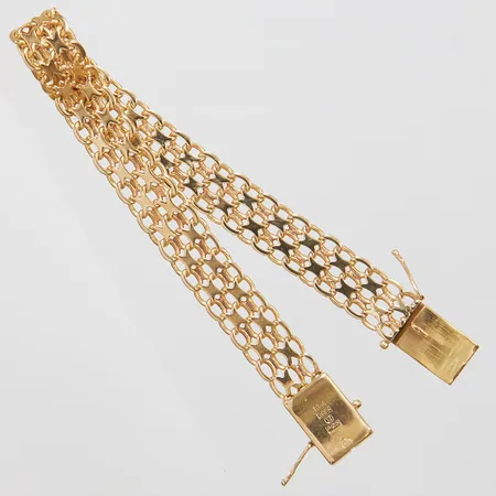 Armband, X-länk, längd: 20cm, bredd: 10mm, svenska stämplar, 18K Vikt: 21,6 g