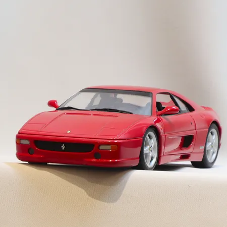 Modellbil UT Models, Ferrari F355, Skala 1:18, längd 23cm, visst slitage, metall samt plast