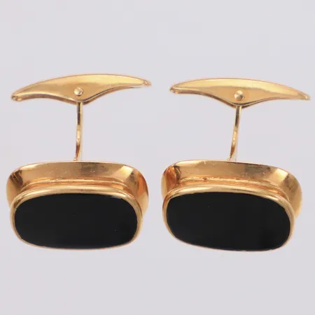 Ett par manschettknappar med svarta stenar, längd 17,9mm, bredd 14,2mm, 18K  Vikt: 7,7 g
