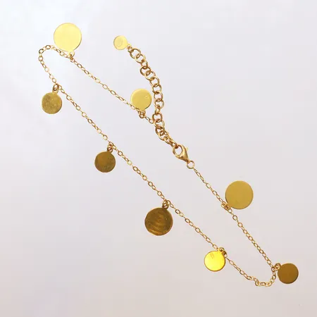 Vristlänk med berlocker, längd 24,5-28,5cm, bredd 1-10mm, 21K.  Vikt: 5,8 g